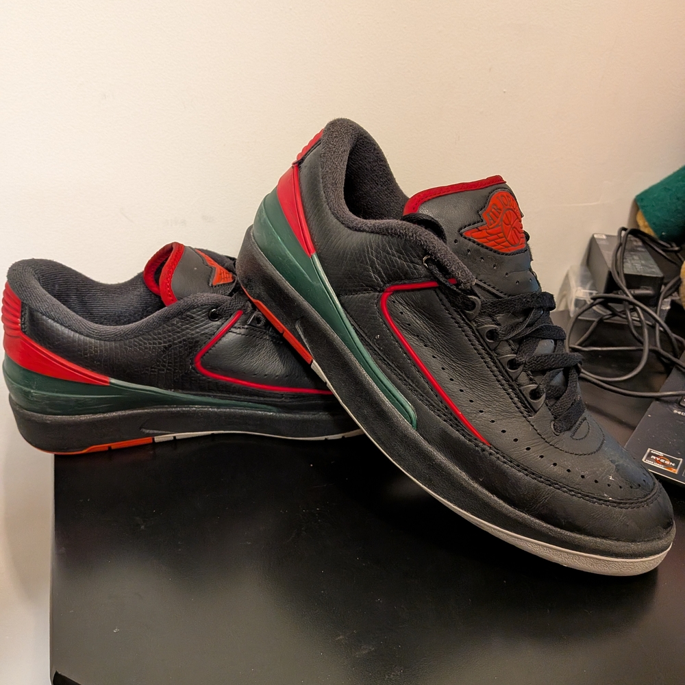 Nike Black and Red Sneakers with Green Accents